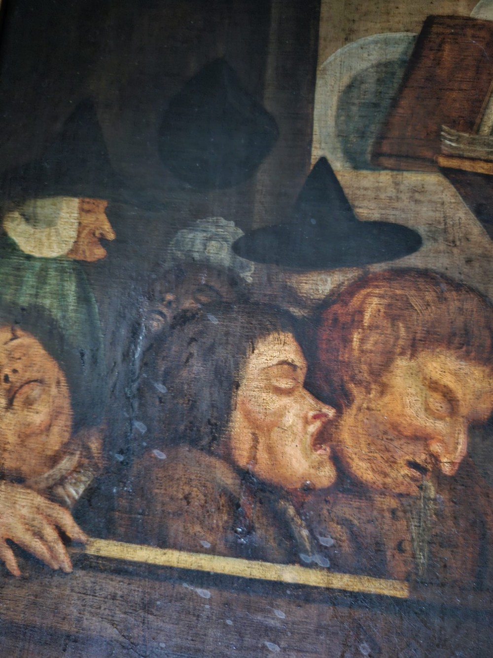 An antique oil painting on canvas depicting a sleeping church congregation inside a moulded giltwood frame. View III