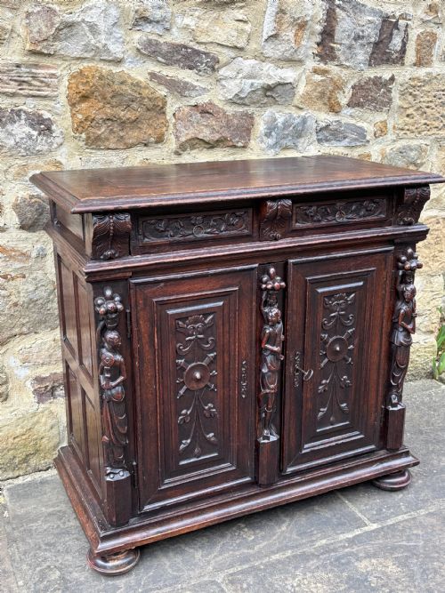 fig 1. Early 17th century Carved Oak Cupboard