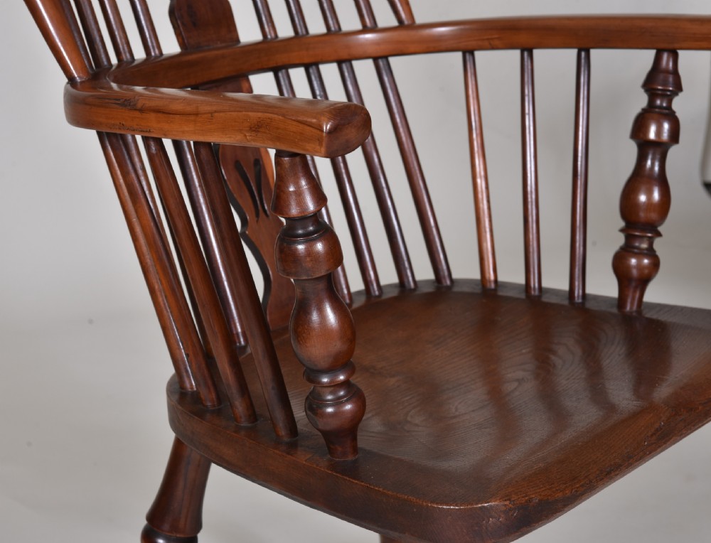 A pair of 19th-century yew wood Windsor armchairs with hoop backs, pierced splats, turned legs, and crinoline stretchers. View IV