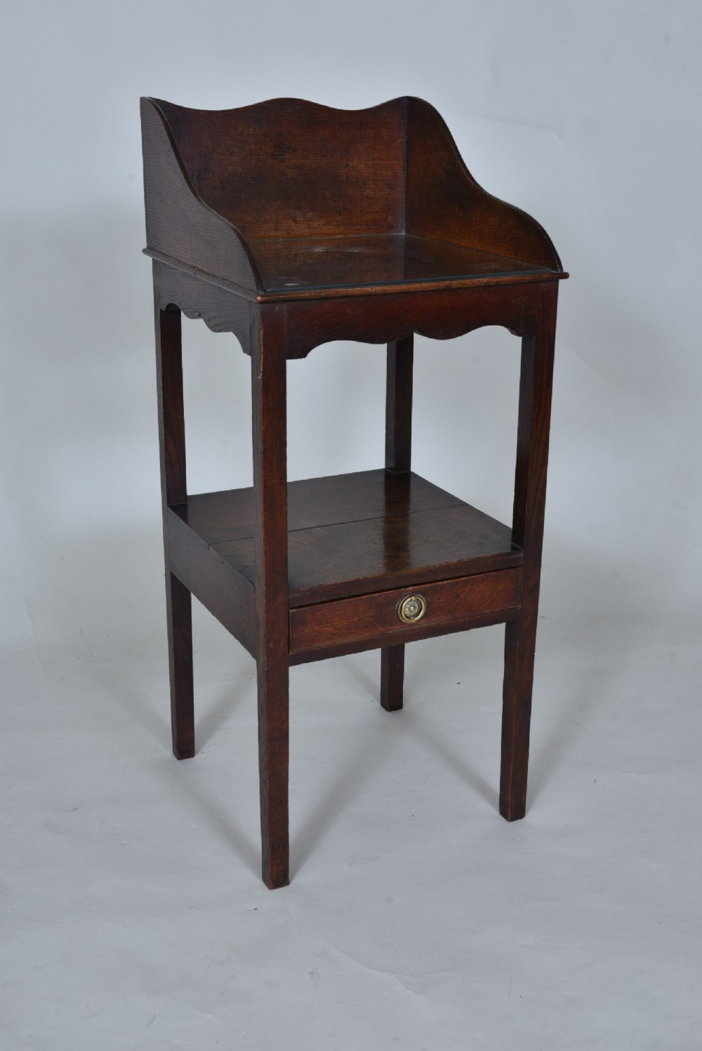 Early 19th century Oak Washstand with glass top.