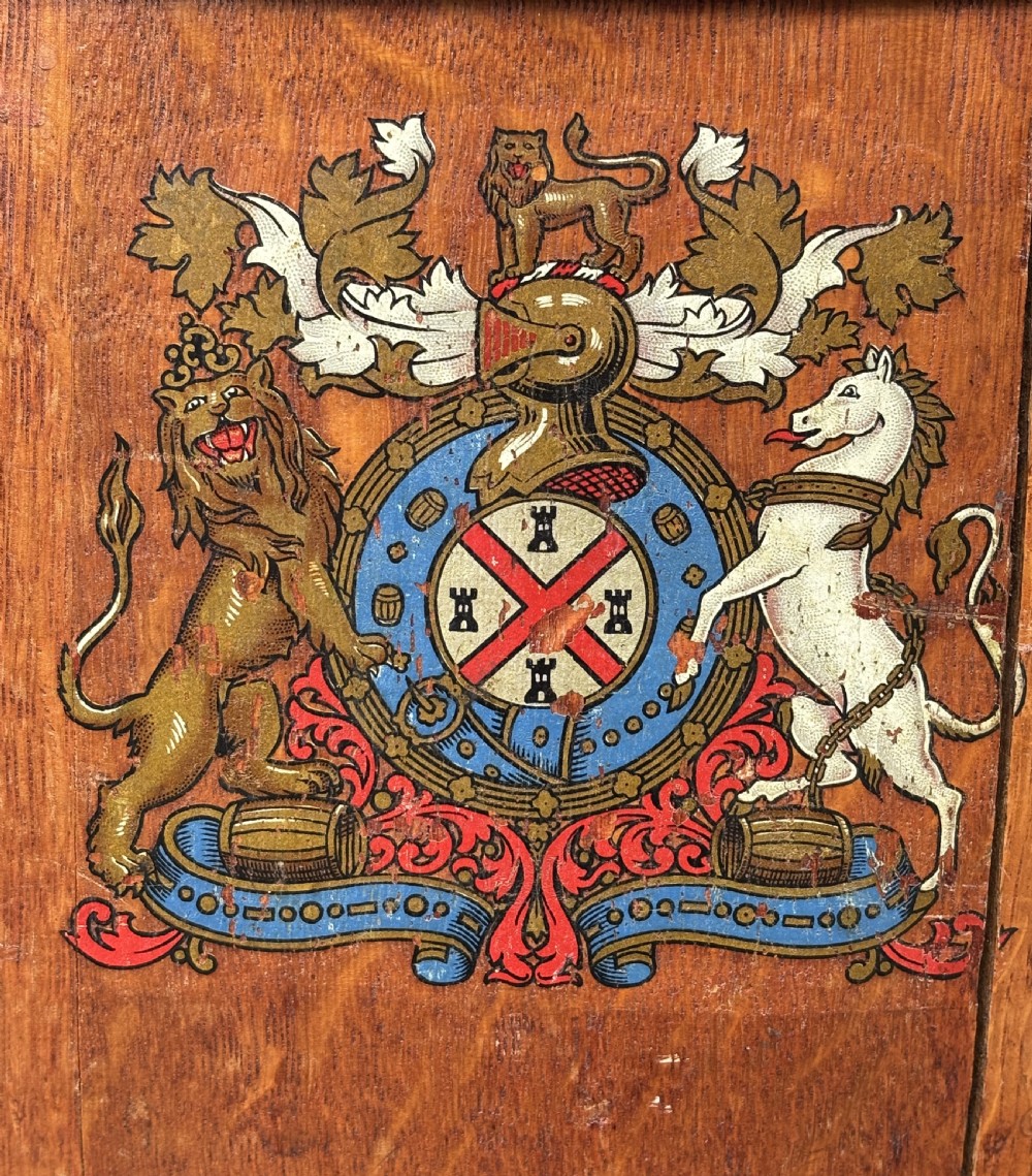 A 19th-century coopered oak barrel stick stand featuring brass hoops and a hand-painted crest on the front. View III