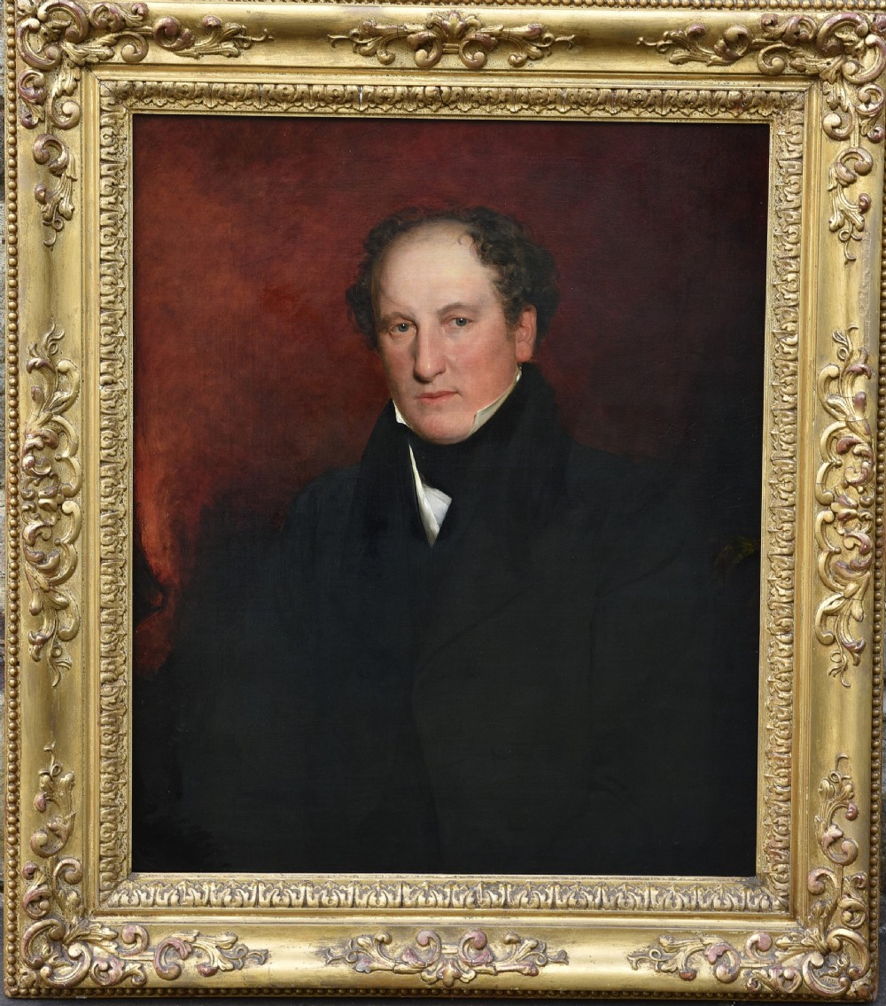 A nineteenth-century oil portrait of a gentleman set inside an ornate gilded frame.