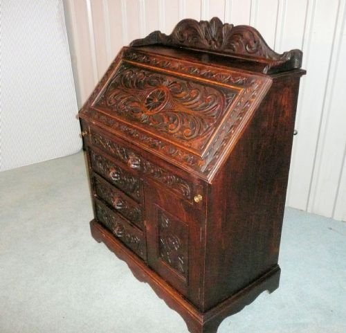 fig 1. VICTORIAN CARVED GREEN MAN PUSSY OAK BUREAU