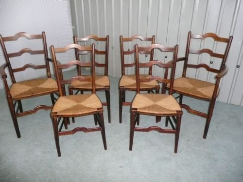 A Set of 6 Ladder Back Country Dining Chairs