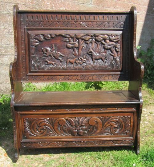 Superb 19th Century Carved Oak Hunting Settle Green Man Bench