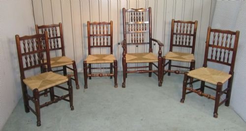 A Harlequin Set of 6 Spindle Back Ladder Back Chairs