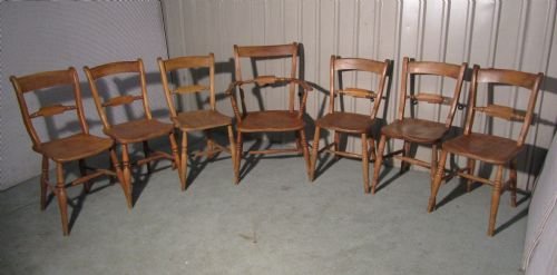 A Harlequin Set of 7 Victorian Rope Back Kitchen Chairs