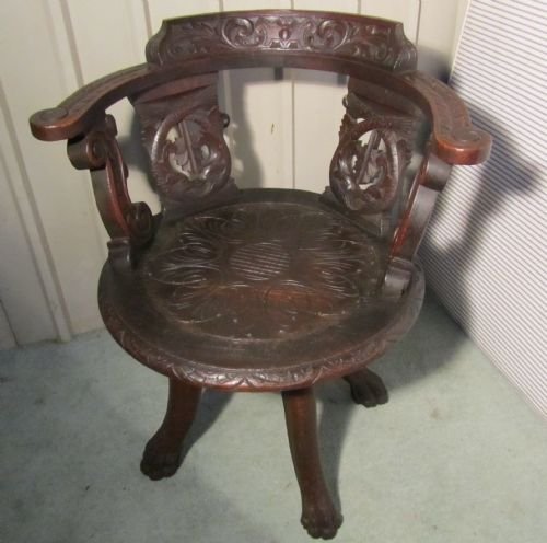 A Victorian Gothic Carved Oak Swiveling Tub Office Chair or Desk Chair