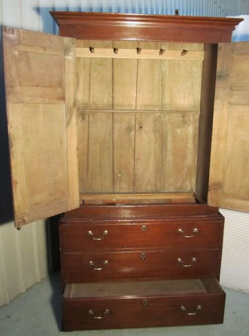 fig 1. A Georgian Dark Pine Linen Press Wardrobe