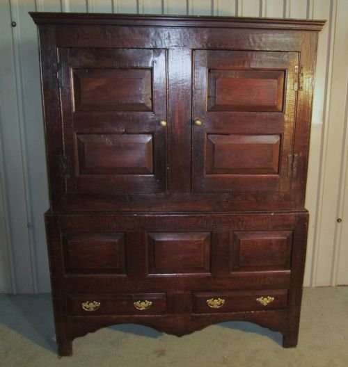 A 17th Century Oak Housekeepers or Cloakroom Cupboard