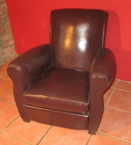 A French Club Arm Chair, in  Dark Brown Leather