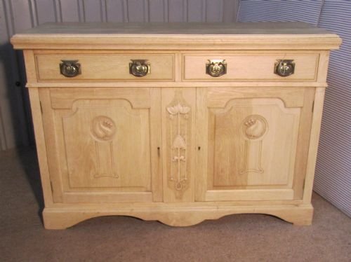 An Arts & Crafts Bleached Oak Sideboard