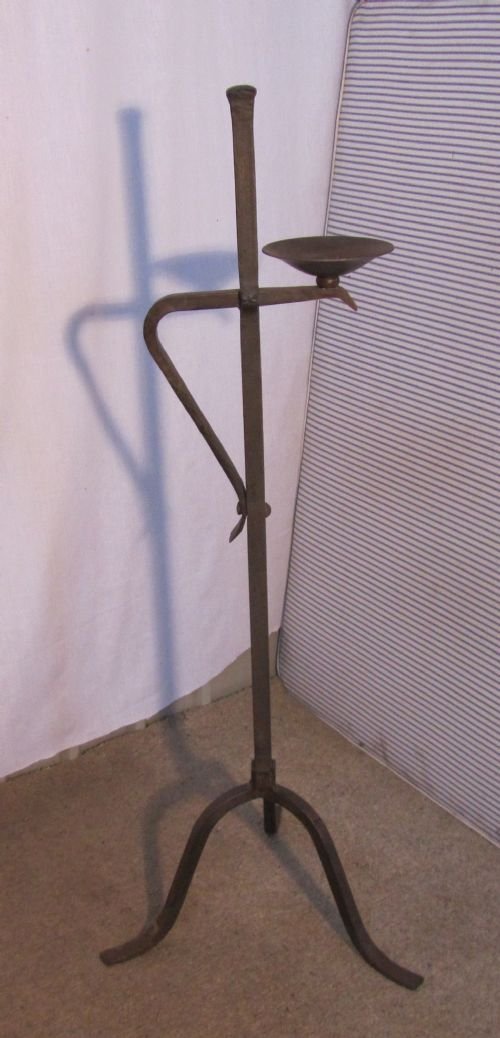 A Large Gothic Iron Candle Stick