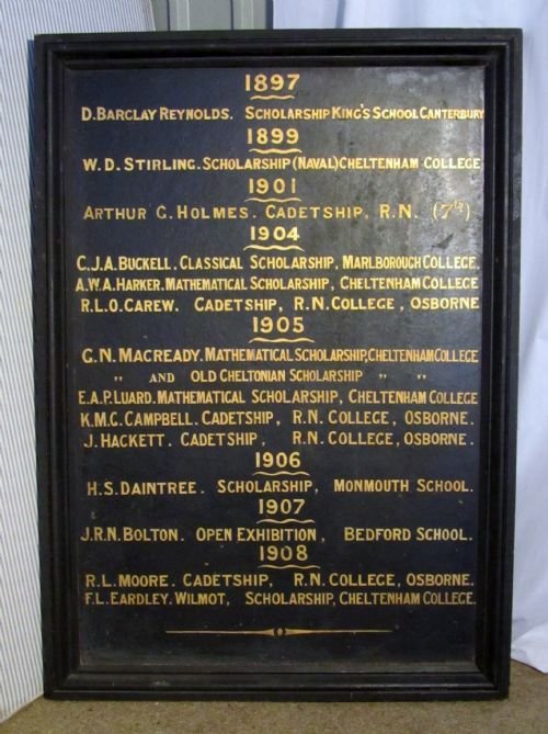 A Large Black and Gold Awards Board