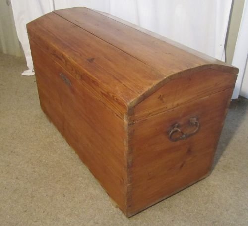 A Large Stripped Pine Dome Top Chest