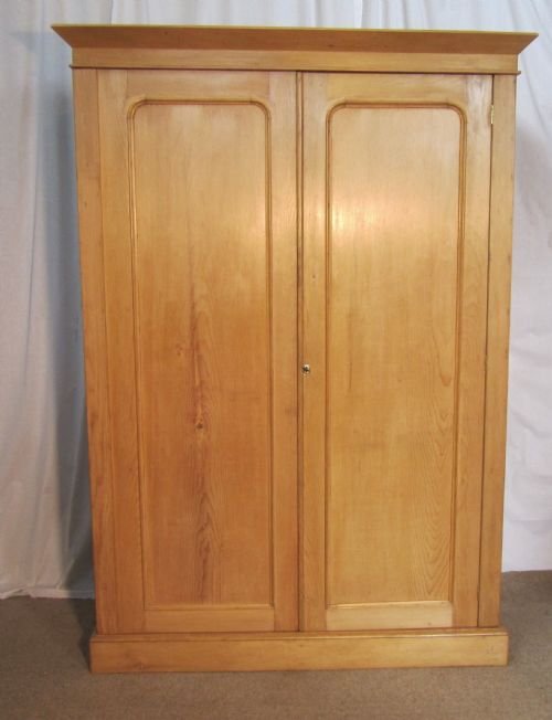 A Victorian Stripped Pine Wardrobe Compactum