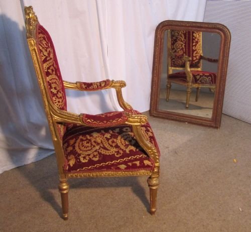 A Very Large Egyptian Carved Gilt Wood Arm Chair.