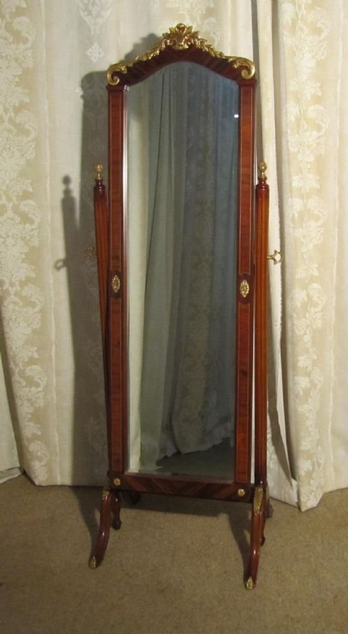 An Inlaid and Ormolu Mahogany Cheval Mirror