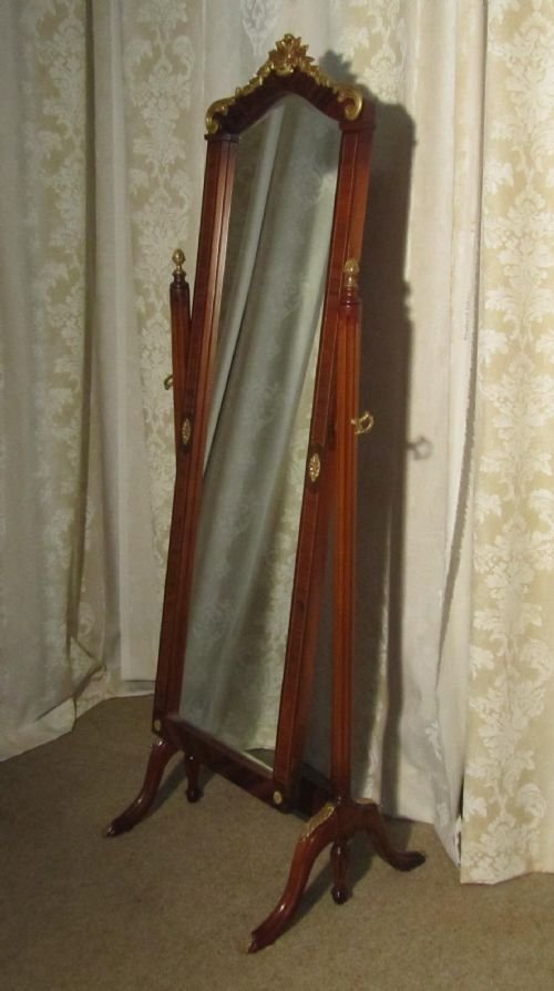 fig 1. An Inlaid and Ormolu Mahogany Cheval Mirror