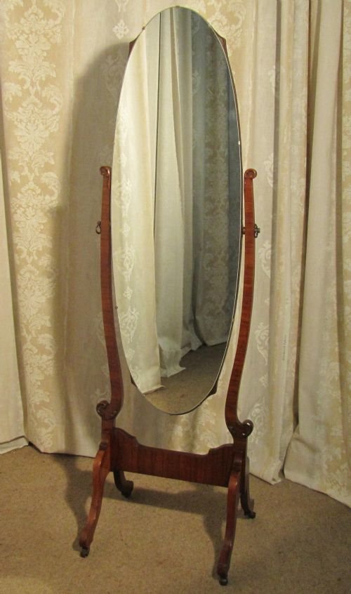 An Edwardian Walnut Cheval Mirror