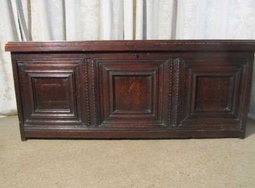 A Large 17th Century Inlaid and Carved Oak Coffer