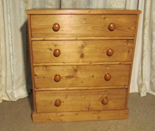 A  Victorian Stripped Pine Chest of Drawers