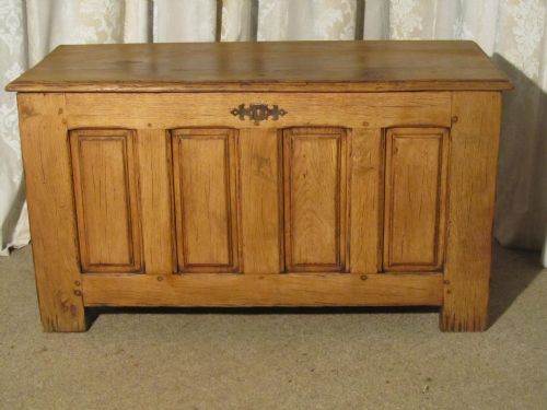 A Large French Panelled Golden Oak and Elm Coffer