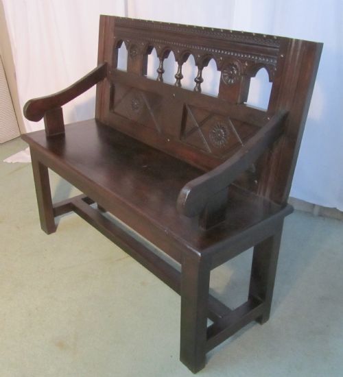 A 19th Century French Breton Style Carved Oak Settle