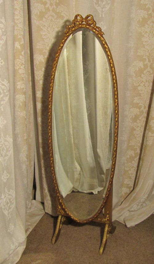 A Superb Art Deco Gilt Oval Cheval Mirror