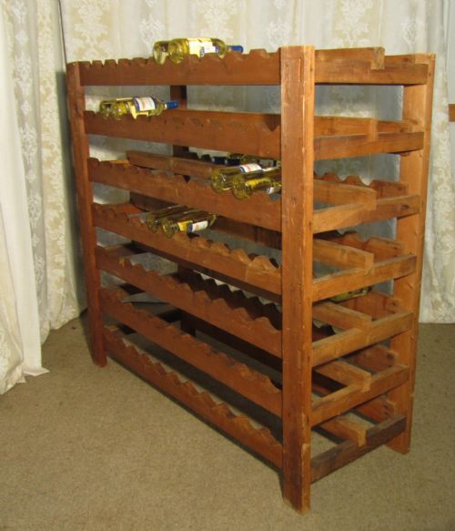 A Large French Pine Cave Wine Rack