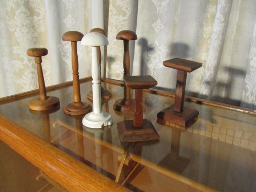 A Collection of Turned Wood Hat Stands and Shop Display Stands