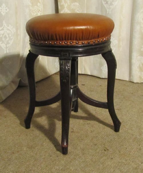 fig 1. A Charming Victorian Ebonised Mahogany and Leather Piano Stool