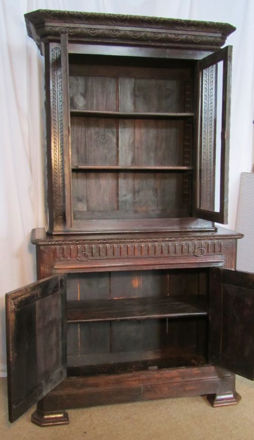 fig 3. French Gothic Green Man Carved Oak Game Cupboard Bookcase