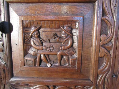 fig 3. A Very Unusual 17th Century Green Man Carved Oak Court Cupboard