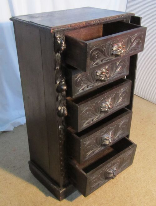 fig 1. Victorian Carved Green Man Oak Wellington Chest