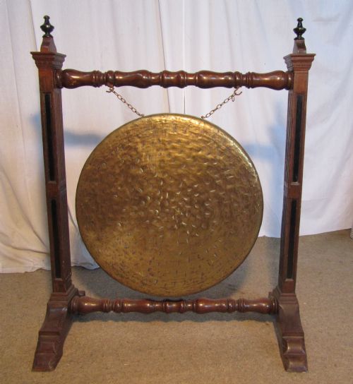 A Large Arts and Crafts Oak & Brass Dinner Gong