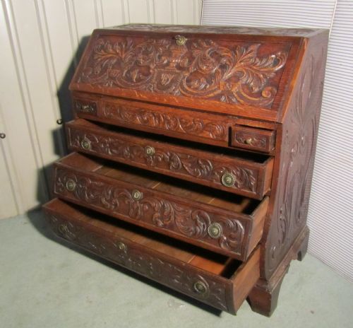 fig 1. A Very Rare Early Victorian Carved Oak Bombé Bureau