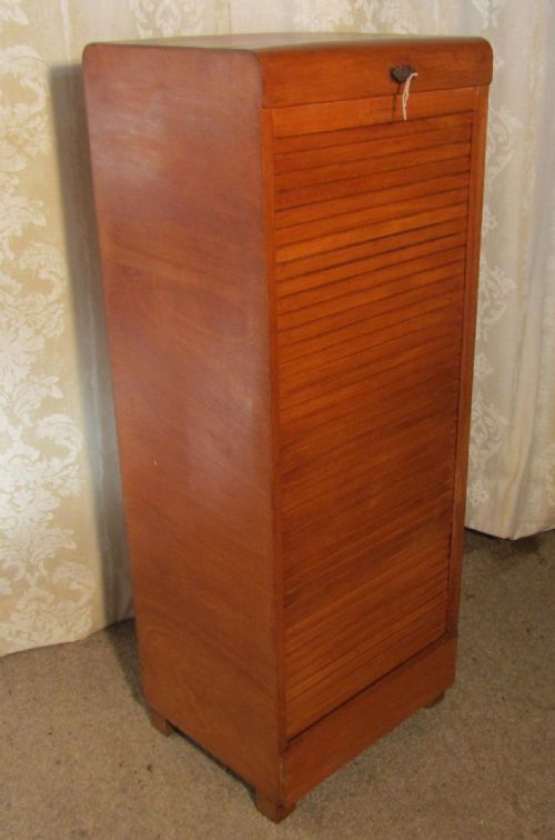 An Oak Art Deco Tambour Fronted Filing Cabinet