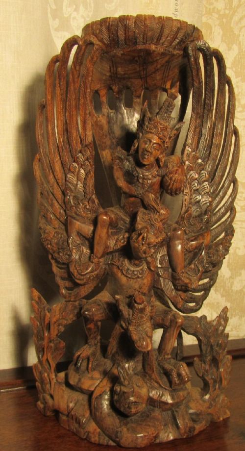 A Carved Wooden Statue of Vishnu and Garuda