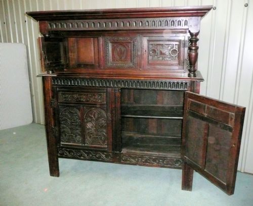 fig 1. 18TH CENTURY CARVED OAK COURT OR LIVERY CUPBOARD