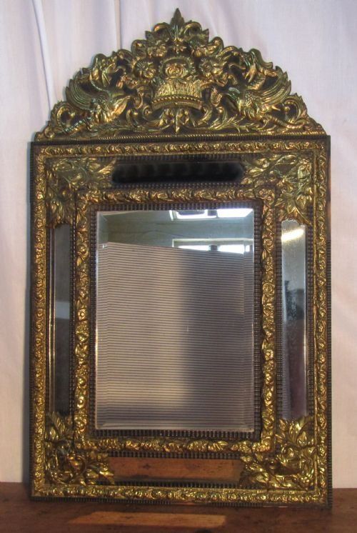 A Large Napoleon 111 French Brass Cushion Mirror