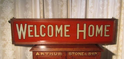 A Large Painted Glass and Mahogany Welcome Home Sign