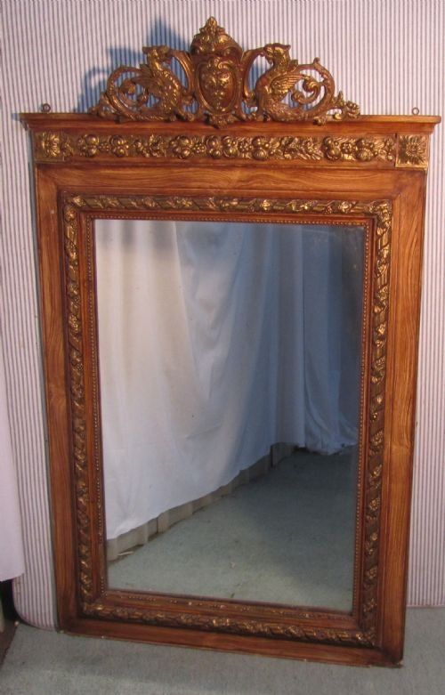 A Large French Dragon Crested and Gilded Wall Mirror