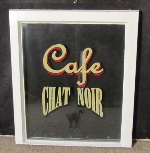 fig 1. A French Sign Written Window Shop Display