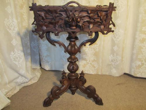 A Black Forest Carved Walnut Planter Jardinière