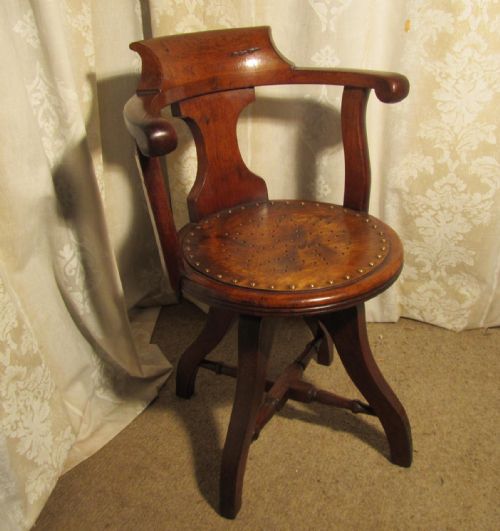 fig 1. A Victorian Swiveling Mahogany Office Chair or Desk Chair