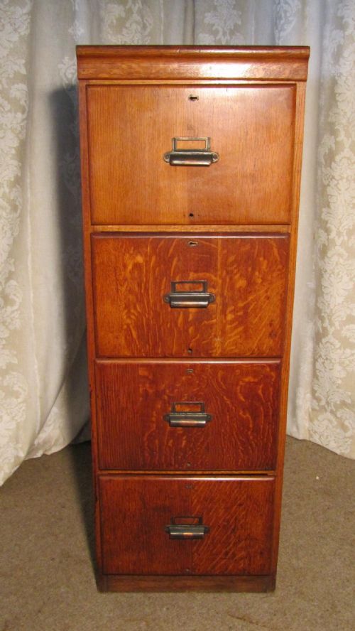 A Large Art Deco 4 Drawer Oak Filing Cabinet