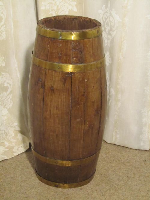 A Brass and Oak Stick Stand, Barrel