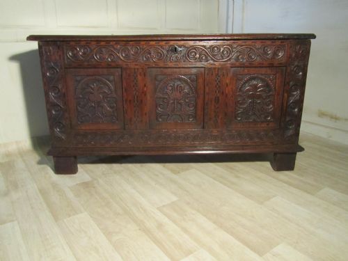 A Large 17th Century Inlaid and Carved Oak Coffer