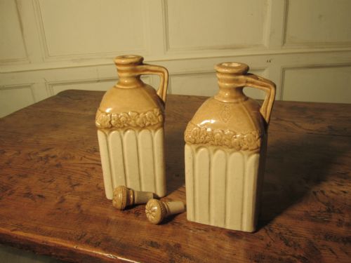 fig 1. A Pair of Earthenware Flagons, Brandy & Whiskey
